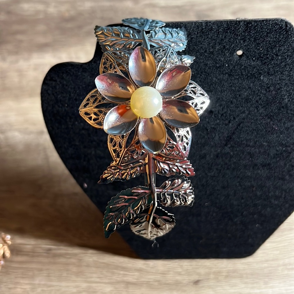 Beautifully detailed leaf and flower headband.